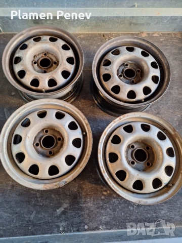 Метални джанти 4х100 R14, 57,1 мм централен отвор, снимка 2 - Гуми и джанти - 52929073