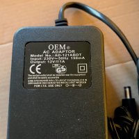 OEM AC/DC адаптори ( захранвания ) на 12V/1A, снимка 1 - Кабели и адаптери - 44231154