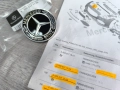 A0008170006**NEU**НОВА ОРИГИНАЛНАТА ЧАСТ**MERCEDES-BENZ**ЕМБЛЕМА  ПРЕДНА**, снимка 1