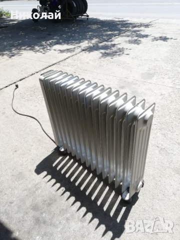 Електрически маслен радиатор Delonghi 