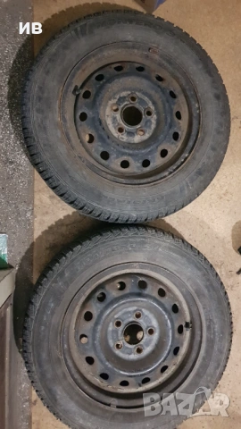 4 бр. зимни гуми + джанти 185/65/14 , снимка 2 - Гуми и джанти - 53459485