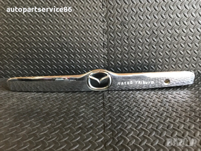 Хромирана лайсна за регистрационен номер за заден капак за Mazda Tribute (2004) E11050811