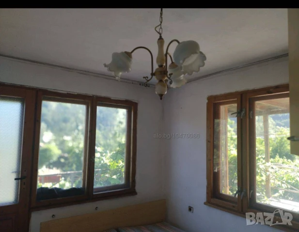 Продавам в гр.Тетевен имот ведно с 4 жил.сгради,гараж и стоп.постройка, снимка 7 - Къщи - 51406240