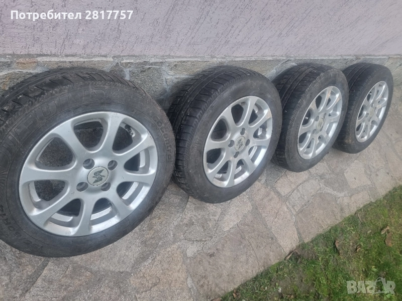 14 цола 4х100 4 броя алуминиеви джанти с гуми 185/60/14, снимка 1