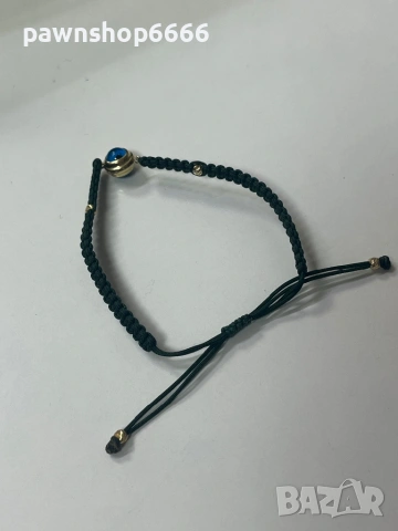 Регулираще се гривна с конец и  златни елементи 14 карата