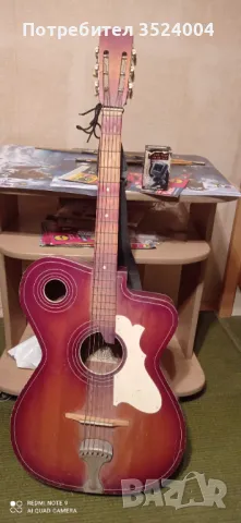 Китара е в изправност може да се свири на нея