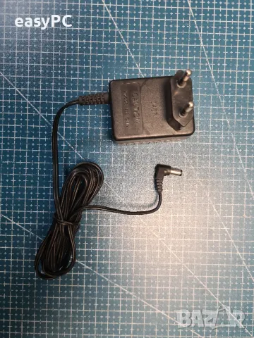 Оригинален захранващ адаптер THOMSON TELECOM VD060035D 6V 350mA, снимка 2 - Друга електроника - 48941932