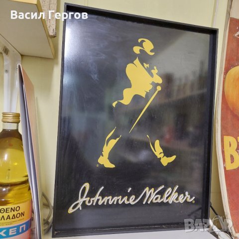 Неонова реклама Джони Уокър