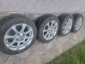 14 цола 4х100 4 броя алуминиеви джанти с гуми 185/60/14, снимка 1