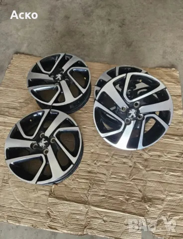 4x100..15цола 4.5j ET45 оригинални Пежо , снимка 2 - Гуми и джанти - 48389824