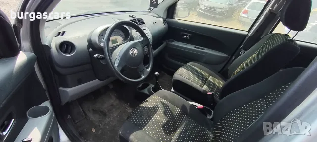 Daihatsu Sirion 1.3 - 91к.с. 2009г., снимка 8 - Автомобили и джипове - 55889154