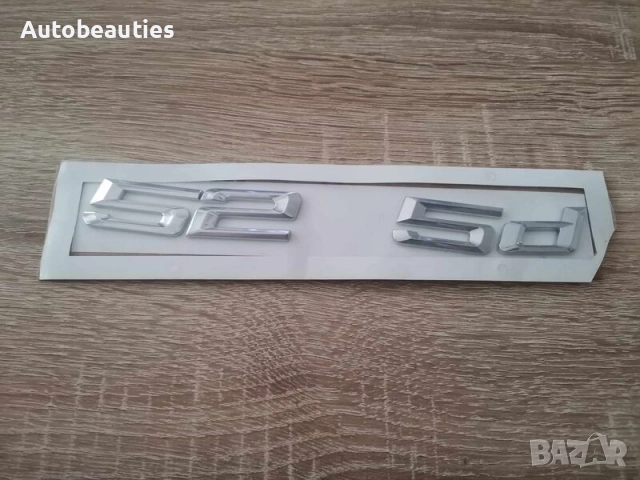 сребриста емблема BMW 525d