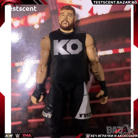 Екшън фигура WWE Kevin Owens Кевин оуенс fight Elite series mattel figure играчка, снимка 1 - Колекции - 48503861