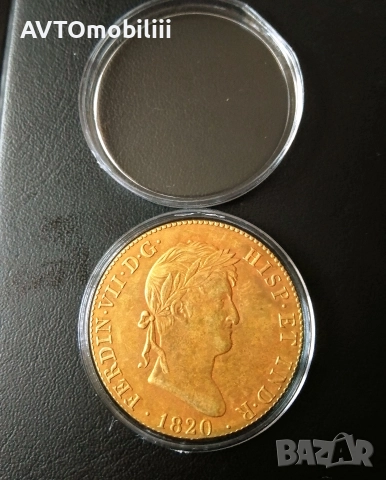 Позлатена голяма испанска монета