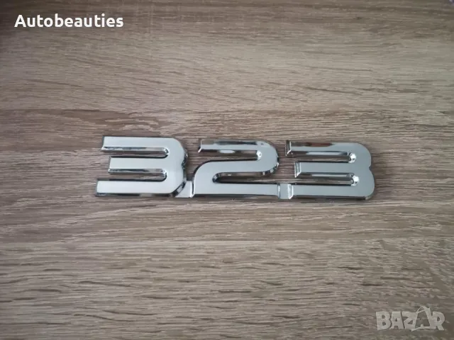 Сребрист надпис Mazda 323