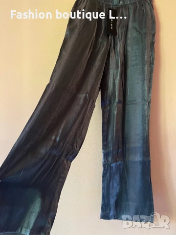 Нов есенен тъмно сребрист панталон с ластик в кръста и странични джобове 36 размер на марката Amisu , снимка 2 - Панталони - 51376823
