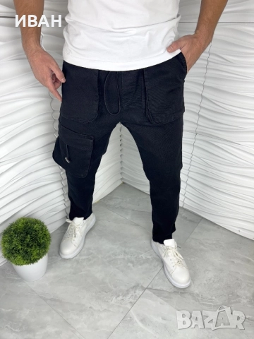 Мъжки дънкови панталони в черен цвят с ефектни джобове