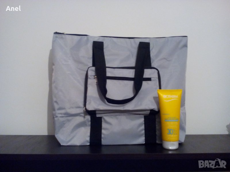 Промо оферта: Biotherm Fluide Solaire SPF 30 Wet or Dry Skin слънцезащитен продукт + сгъваема чанта, снимка 1