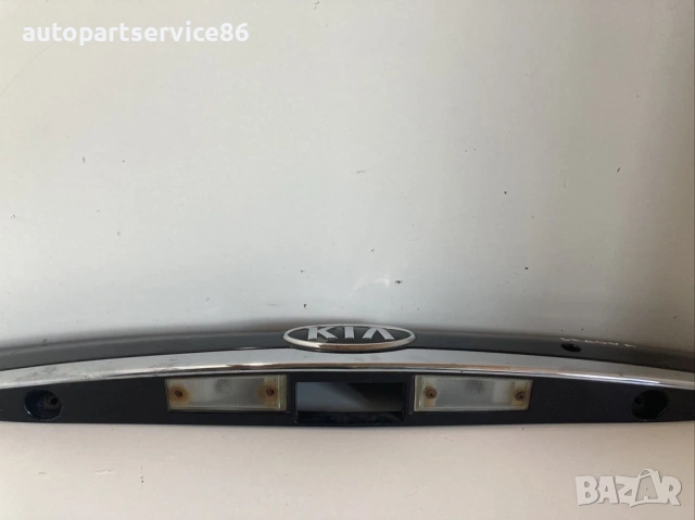 Лайсна за регистрационен номер на задния капак черна за KIA Carnival 2.9 CRDi (2006–2012), снимка 2 - Части - 53218700