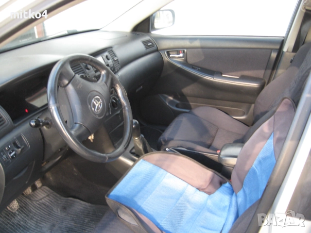тойота корола 2,0d-4d e12 комби , снимка 12 - Автомобили и джипове - 52598823