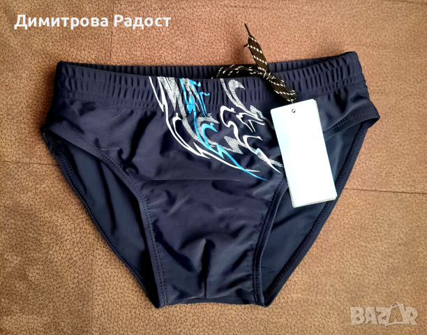 Детски бански.Цвят тъмно син.Размер S.
