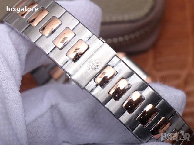 Мъжки часовник Patek Philippe Nautilus 5980 с автоматичен швейцарски механизъм, снимка 9 - Луксозни - 44384598