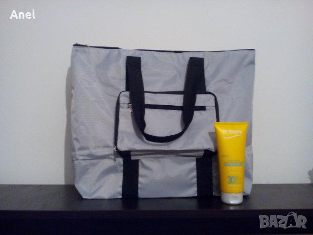 Промо оферта: Biotherm Fluide Solaire SPF 30 Wet or Dry Skin слънцезащитен продукт + сгъваема чанта, снимка 1 - Козметика за лице - 28754914