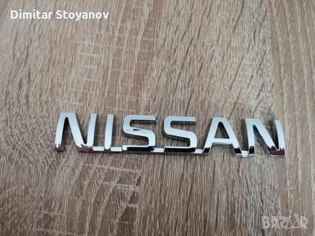 надпис лого Нисан Nissan 