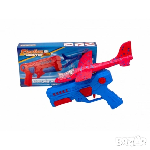 Пистолет изстрелвачка на самолет със светещ стиропорен самолет