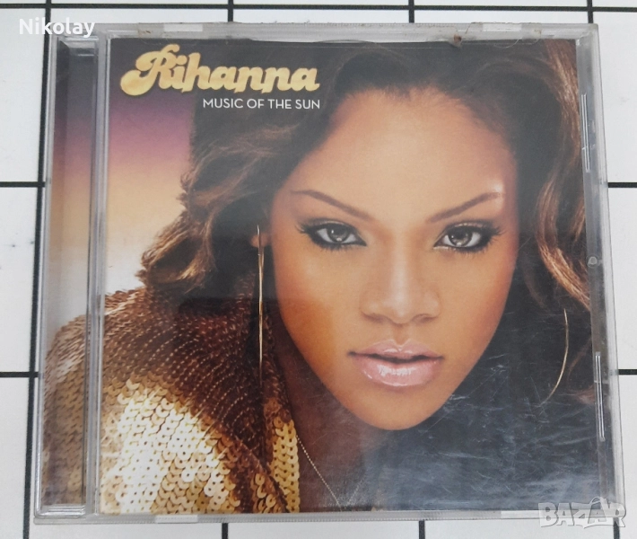 ТЪРСЯ Rihanna - Music of the sun, снимка 1