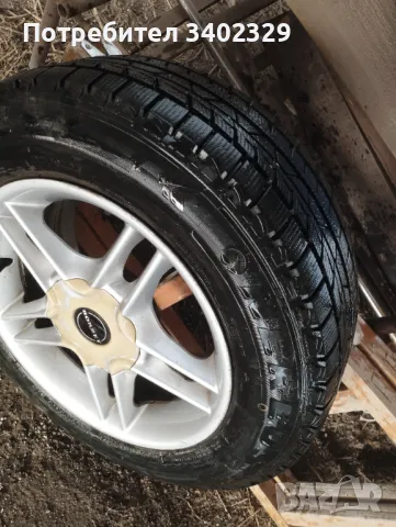 Зимни гуми с джанти 15, снимка 4 - Гуми и джанти - 50048717