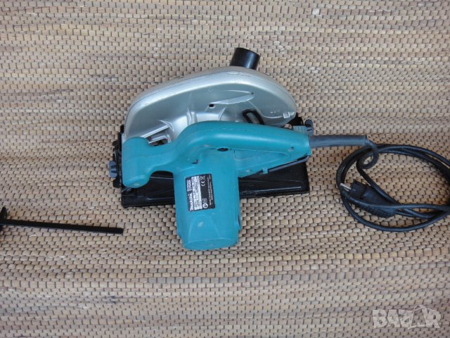 Ръчен циркуляр Makita 5704R, снимка 2 - Други инструменти - 37350663