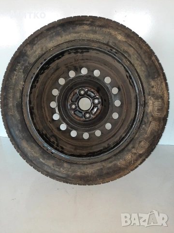 Желязна джанта с гума 15 ка за Тойота Ярис или Корола с 4 дупки, снимка 3 - Гуми и джанти - 53738925