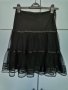 Официална черна дамска пола с тюл, снимка 1 - Поли - 41505532