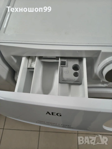 Комбинирана пералня със сушилня AEG 7000 Series