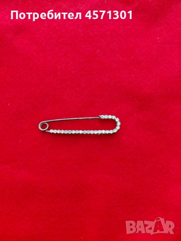 Брошка игла