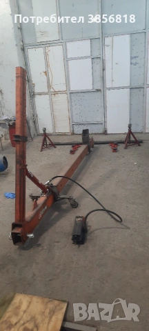 Дозер -греда за изпъване на ударени автомобили.