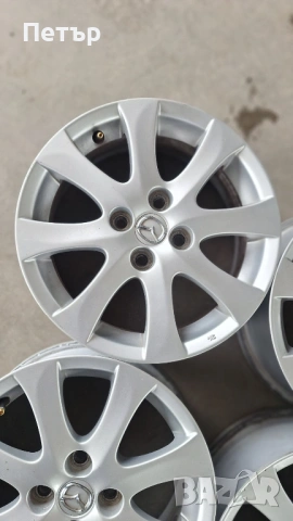 ОРИГИНАЛНИ АЛУМИНИЕВИ ДЖАНТИ ЗА МАЗДА -4Х100Х54-15цола, снимка 2 - Гуми и джанти - 53632405
