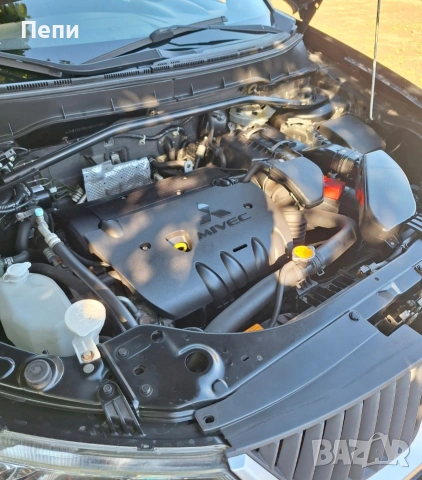 Mitsubishi Outlander 2.4 4x4 ръчна с.к, снимка 3 - Автомобили и джипове - 53649394