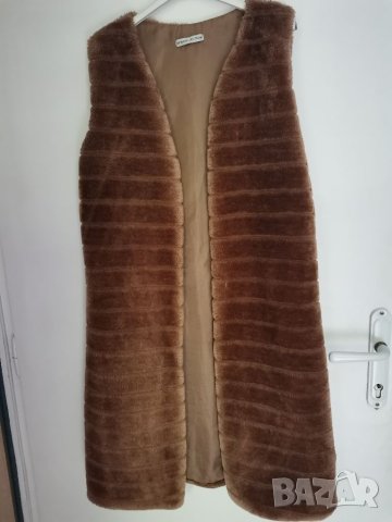 Пухкав дълъг дамски елек