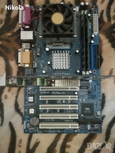 Продавам/Бартер Дъно AS Rock K7VT4A PRO с процесор AMD Sempron 2500+, Видеокарта GV-N55128DP и Памет, снимка 1