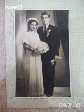 Снимка на младоженци