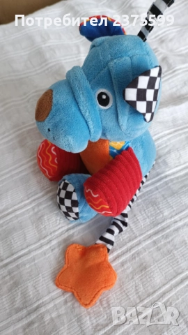 Плюшена музикална играчка синьо куче Lorelli