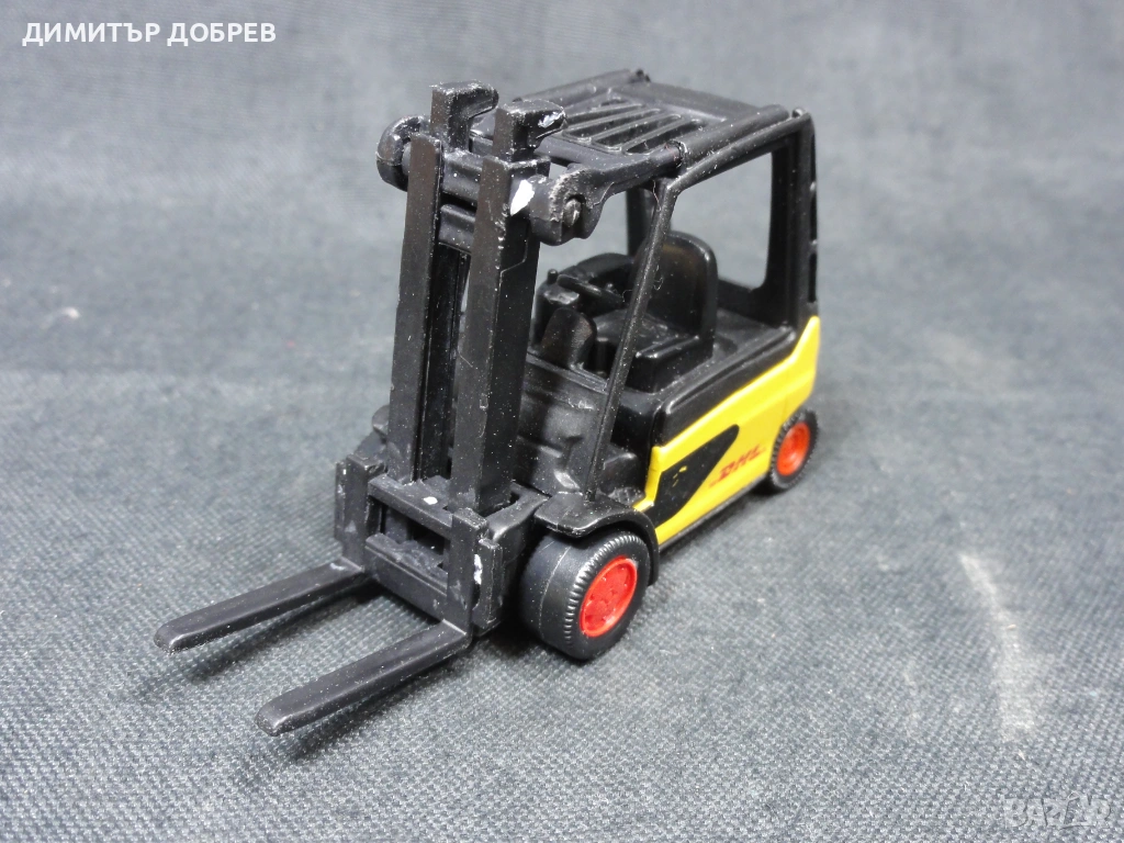 МЕТАЛНА КОЛИЧКА МОТОКАР DHL SIKU, снимка 1