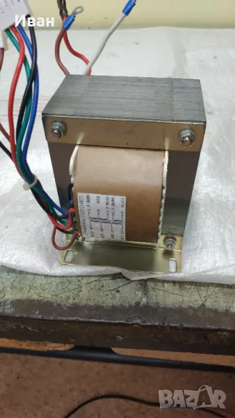 Трансформатор две по 15 и едно 27 волта. , снимка 1