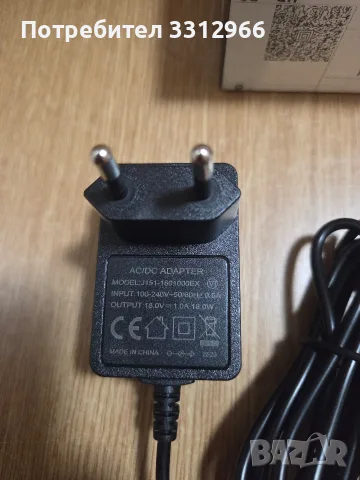Захранващ адаптер модел J151-1801000EX с изходно напрежение 18.0V и ток 1.0A., снимка 2 - Кабели и адаптери - 56154623