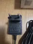 Захранващ адаптер модел J151-1801000EX с изходно напрежение 18.0V и ток 1.0A., снимка 2