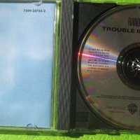 Randy Newman – Trouble In Paradise CD , снимка 3 - CD дискове - 41346747