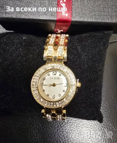 Guess Ръчен Златист Часовник С Кристали И Бял Циферблат В Кутия Код VL-131