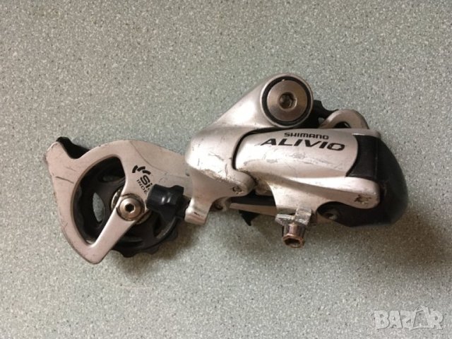 Заден дерайльор за колело Shimano Alivio в Части за велосипеди в гр ...